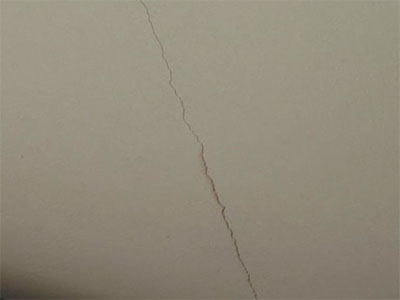 fix crack in wall plaster